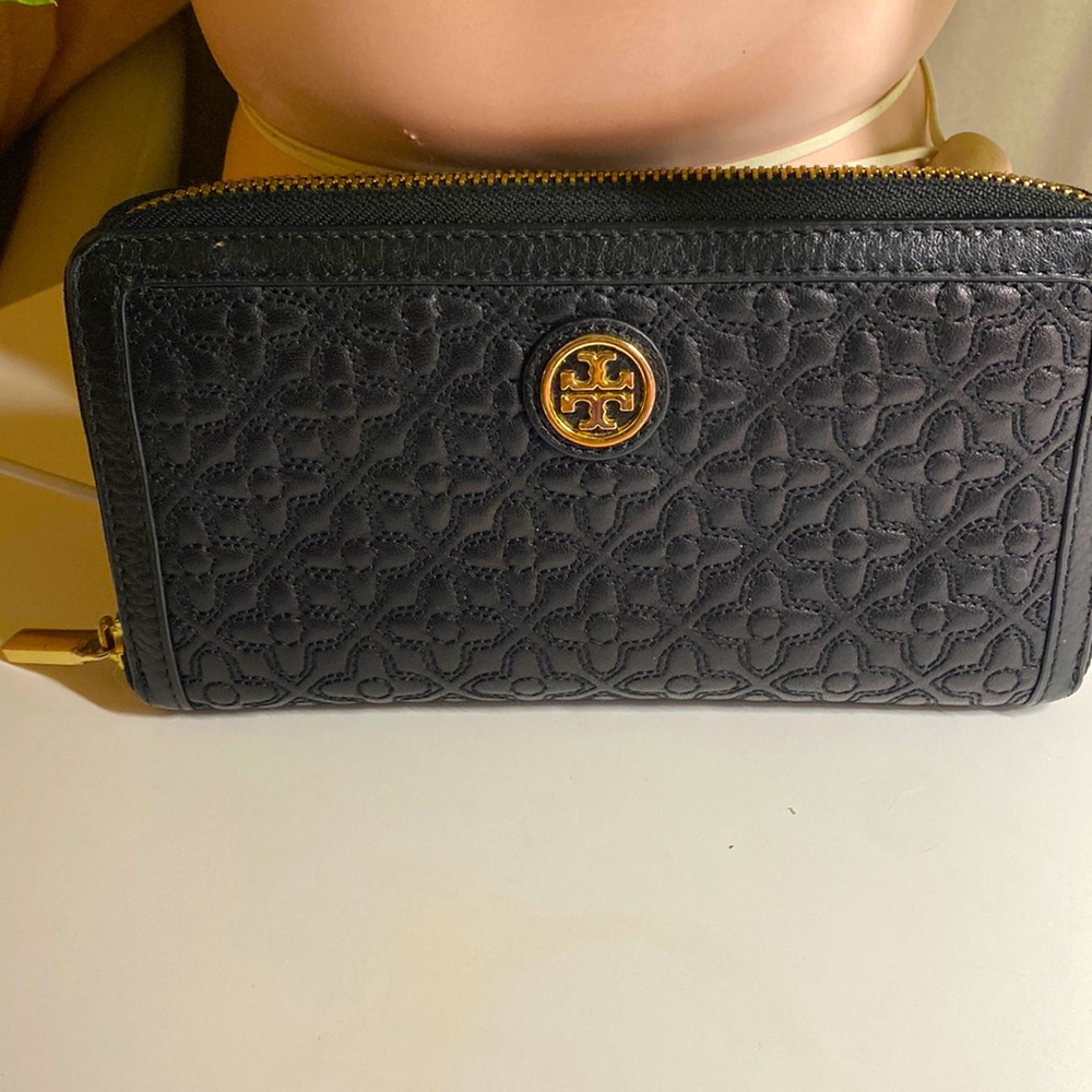 Tory Burch black zip around wallets with lots of space.  excellent condition